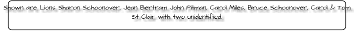 Shown are Lions Sharon Schoonover, Jean Bertram John Pitman, Carol Miles, Bruce Schoonover, Carol & Tom St Clair with two unidentified.